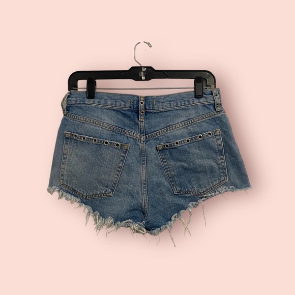 Free People Distressed Cutoff Shorts in Medium Blue Denim - Picture 7 of 7